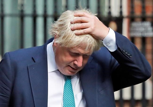 The Latest: UK shifts Brexit team; opposition sees "chaos" | iNFOnews.ca CP619854543