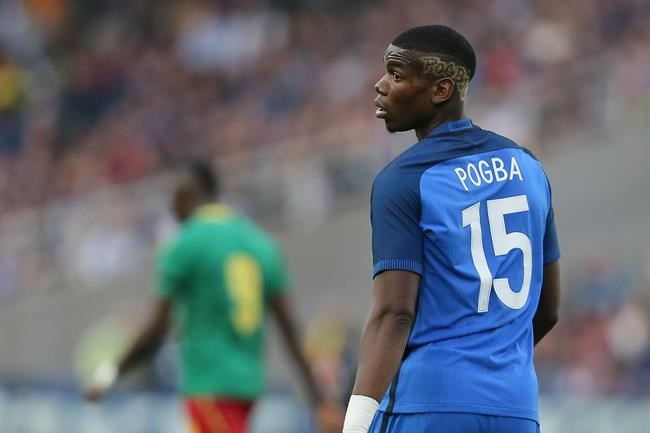 Pogba banned for United's 1st game of Premier League season | iNFOnews.ca CP1990748929