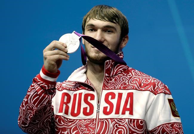 Russian weightlifter loses 2012 Olympic silver in dope case | iNFOnews.ca