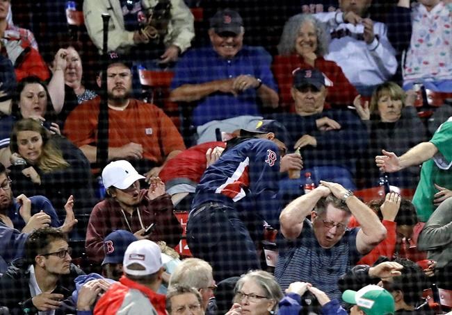 Fenway fan hit in head by Devon Travis' thrown bat | iNFOnews.ca