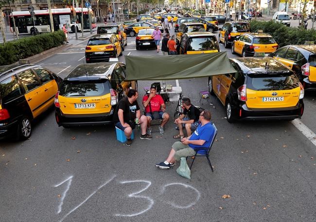 Spanish taxi driver protest retains momentum, snarls traffic | iNFOnews.ca Spanish taxi driver protest retains momentum, snarls traffic | iNFOnews.ca