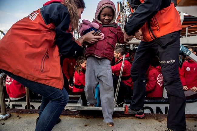 Boat with 300 migrants arrives in Spain after week at sea | iNFOnews.ca