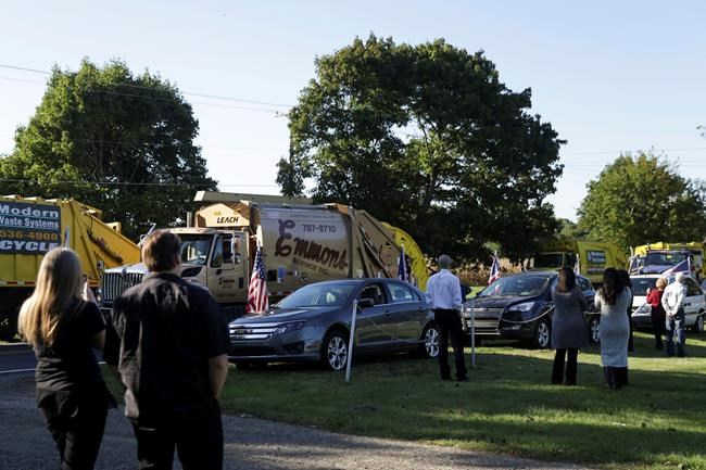 Garbage trucks honour sanitation worker who died on the job | iNFOnews.ca