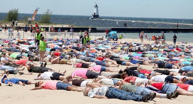 Western Michigan city breaks sand angel world record | iNFOnews.ca