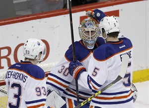Benoit Pouliot's 2 goals, Ben Scrivens' 33 saves help Oilers beat surging Wild 2-1 | iNFOnews.ca CP32041198