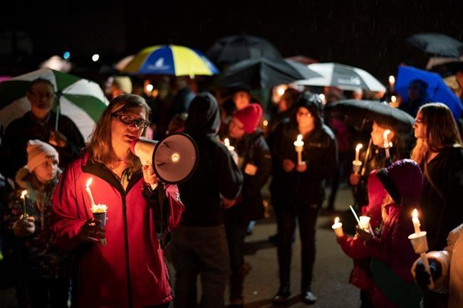 The Latest: Hundreds gather for vigil for Girl Scouts killed | iNFOnews.ca