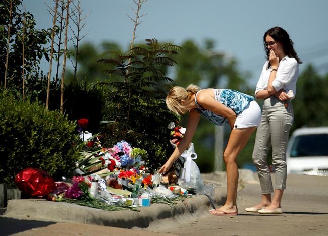 The Latest: Woman gives survivors flowers at boat memorial | iNFOnews.ca The Latest: Woman gives survivors flowers at boat memorial | iNFOnews.ca