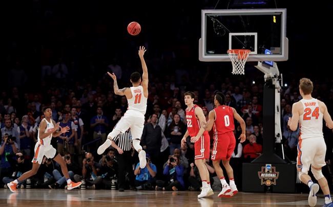 The Latest: Chiozza's 3 gives SEC an Elite Eight trio | iNFOnews.ca