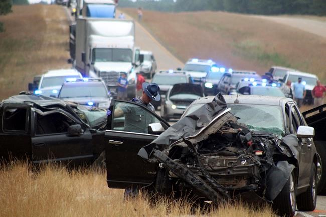 Report: Truck crossed highway line in crash that killed 8 | iNFOnews.ca CP1944504903