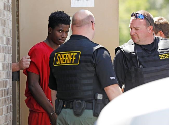 The Latest: Probable cause to hold teens in child's death | iNFOnews.ca