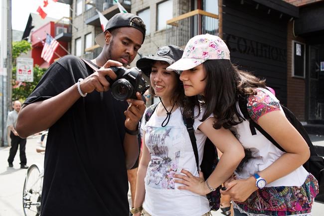 Newly arrived refugee youth explore their new homeland through photography | iNFOnews.ca CP644721660