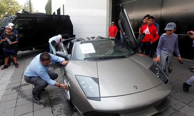 Mexico auctions seized vehicles outside presidential mansion | iNFOnews.ca