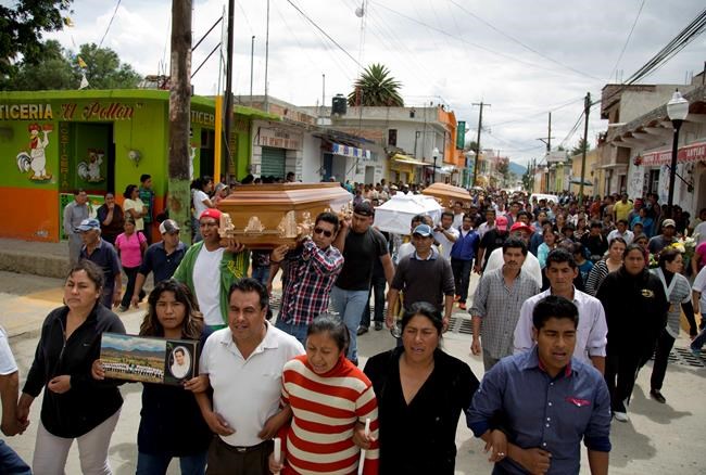 Mexico town buries dead after clash between teachers, police | iNFOnews.ca Mexico town buries dead after clash between teachers, police | iNFOnews.ca