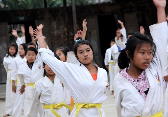 Uprooted by war, fearing troops, Myanmar girls learn karate | iNFOnews.ca