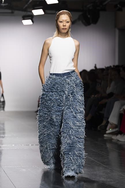 Far from home, Ukrainian designers showcase fashion created amid air raid sirens | iNFOnews.ca