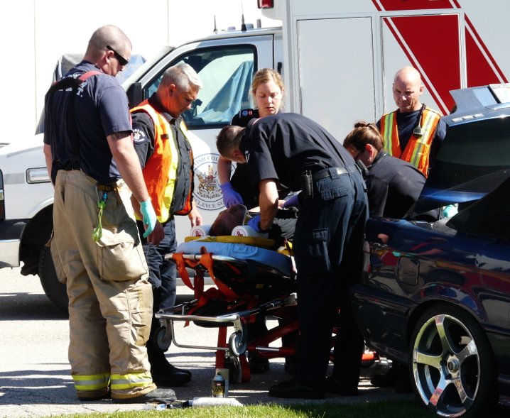Man injured after driving car over embankment into yard at a north end business | iNFOnews.ca