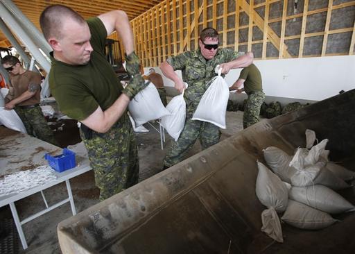 Harper tours areas in Manitoba threatened by flooding | iNFOnews.ca Harper tours areas in Manitoba threatened by flooding | iNFOnews.ca