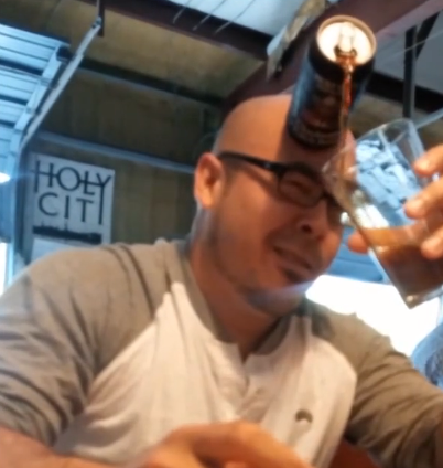 Guy pours beer with forehead | iNFOnews.ca Guy pours beer with forehead | iNFOnews.ca