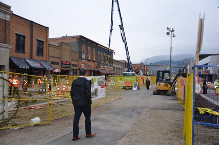 Sidewalk paving brings Bernard Avenue one step closer to completion | iNFOnews.ca
