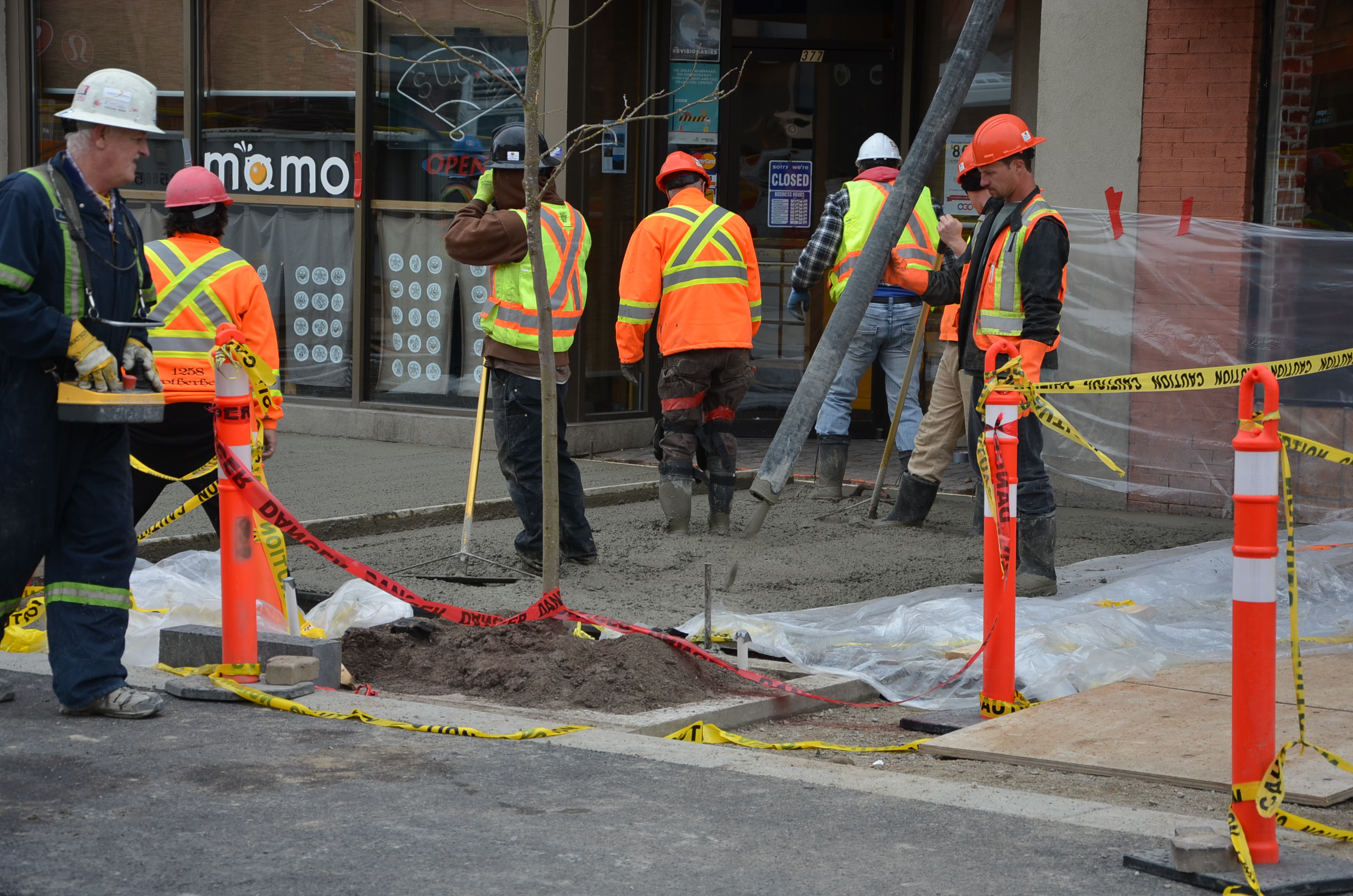 Sidewalk paving brings Bernard Avenue one step closer to completion | iNFOnews.ca