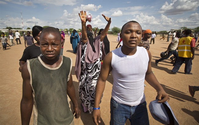 Kenya's president vows harsh action against Somalia's extremists after attack on college | iNFOnews.ca