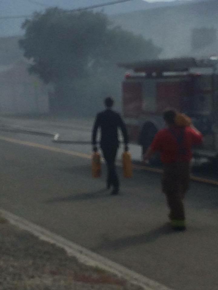 Volunteer Ashcroft firefighter dressed in tux helps crew on grad night | iNFOnews.ca