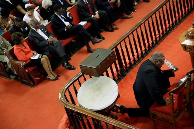 Historic black church holds 1st service since 9 members slain; bells toll for victims | iNFOnews.ca Historic black church holds 1st service since 9 members slain; bells toll for victims | iNFOnews.ca