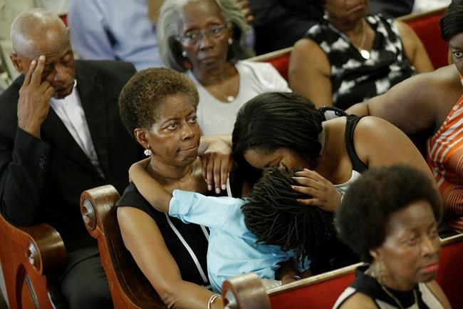 Historic black church holds 1st service since 9 members slain; bells toll for victims | iNFOnews.ca Historic black church holds 1st service since 9 members slain; bells toll for victims | iNFOnews.ca