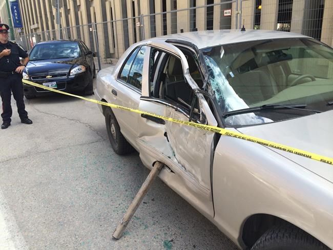 Ticketed for using cellphone while driving, upset man rams police cars at Winnipeg headquarters | iNFOnews.ca