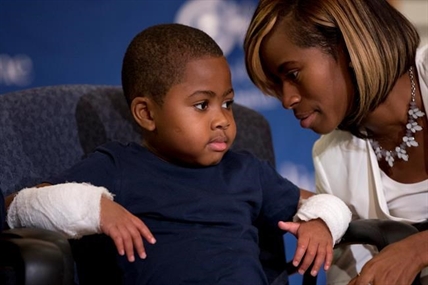 Boy, 8, who lost limbs to infection becomes youngest double-hand transplant recipient | iNFOnews.ca
