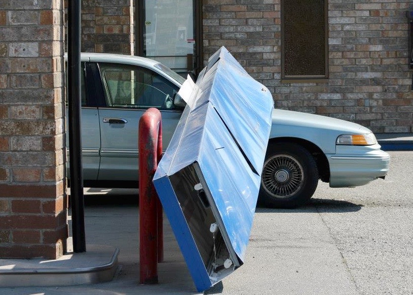 Falling signage slams car at Penticton gas station | iNFOnews.ca