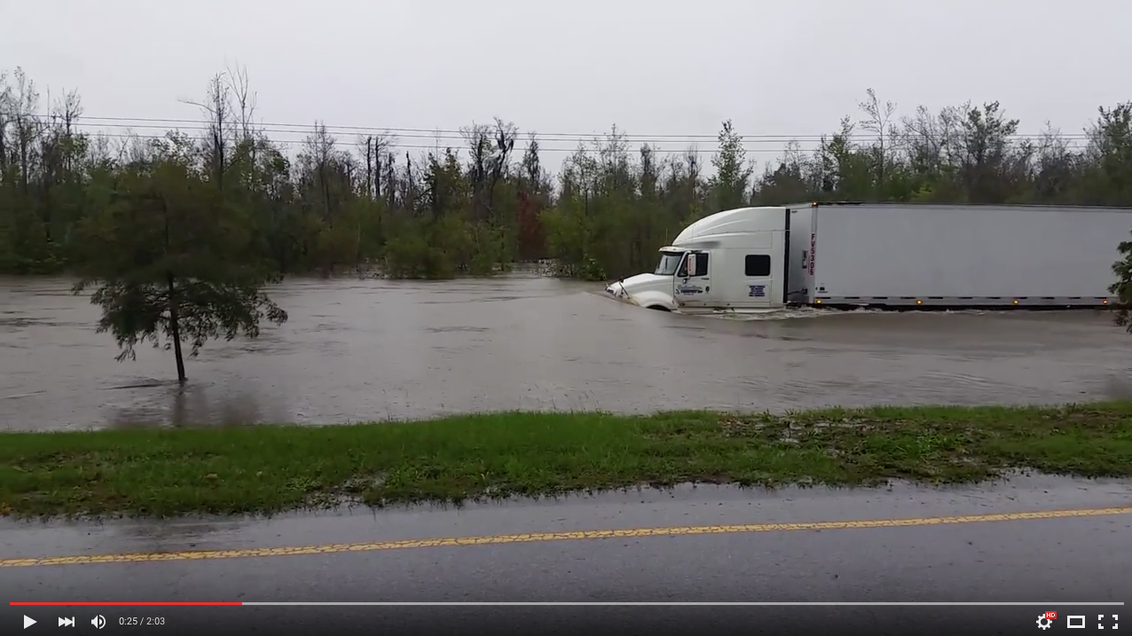 TRENDING NOW: Amazing video of semi driving on flooded road | iNFOnews.ca TRENDING NOW: Amazing video of semi driving on flooded road | iNFOnews.ca