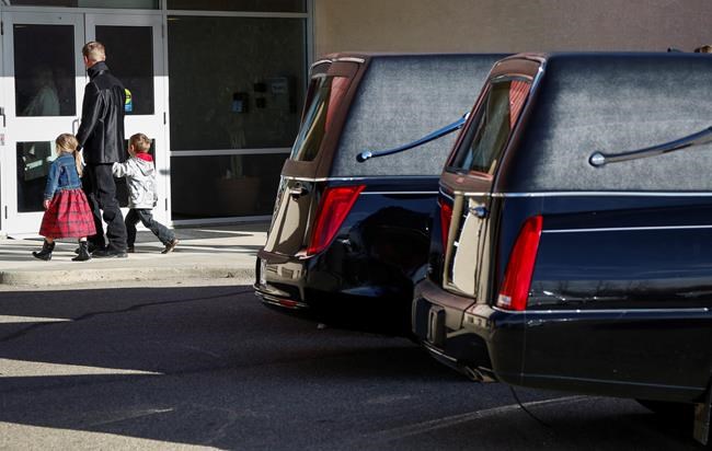 'Why, why why?' Funeral held for three Alberta sisters buried in grain truck | iNFOnews.ca