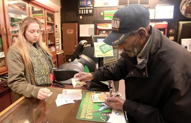 As Powerball sales break records, odds increase that someone will win $900 million jackpot | iNFOnews.ca