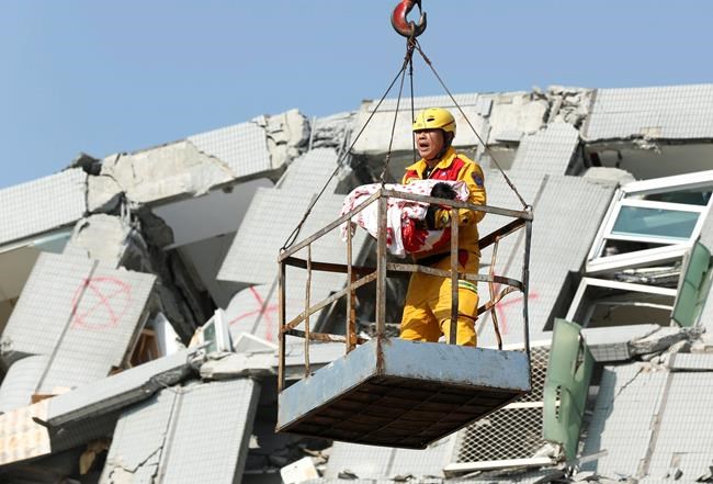 Survivors pulled out from building two days after Taiwan quake | iNFOnews.ca Survivors pulled out from building two days after Taiwan quake | iNFOnews.ca