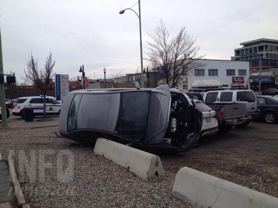 Car flipped on side in downtown Kelowna crash | iNFOnews.ca Car flipped on side in downtown Kelowna crash | iNFOnews.ca