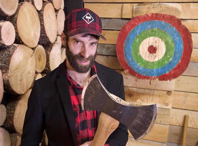 Traditional Canadian lumberjack sport axe throwing enjoying popularity in Canada | iNFOnews.ca