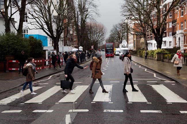 Come Together: Beatles fans still flock to zebra crossing for Abbey Road photo | iNFOnews.ca Come Together: Beatles fans still flock to zebra crossing for Abbey Road photo | iNFOnews.ca