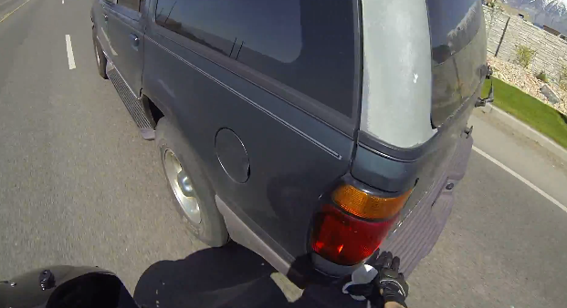 Motorcyclist saves coffee cup off SUV bumper | iNFOnews.ca Motorcyclist saves coffee cup off SUV bumper | iNFOnews.ca