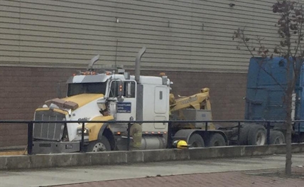 Tow truck pulling semi crashes into Salmon Arm mall | iNFOnews.ca