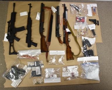 Storage locker found with assault rifles, dynamite and heroin | iNFOnews.ca