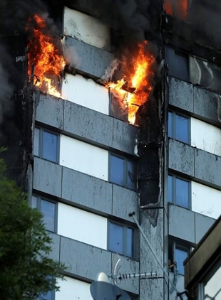 Kids tossed from windows to escape London high-rise blaze | iNFOnews.ca
