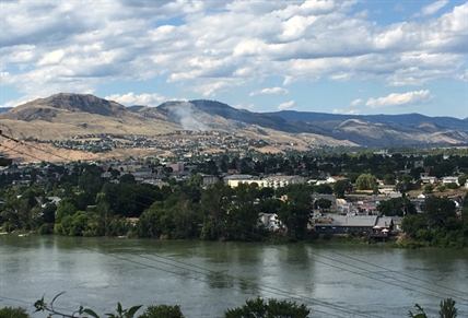 UPDATE: Grassfire burning near Batchelor Height homes quickly doused | iNFOnews.ca