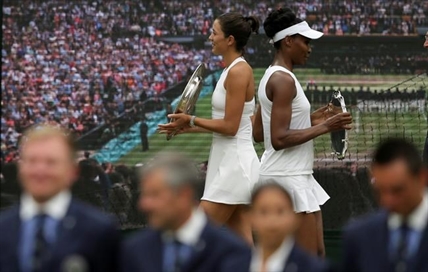 Muguruza beats 'role model' Williams for 1st Wimbledon title | iNFOnews.ca Muguruza beats 'role model' Williams for 1st Wimbledon title | iNFOnews.ca