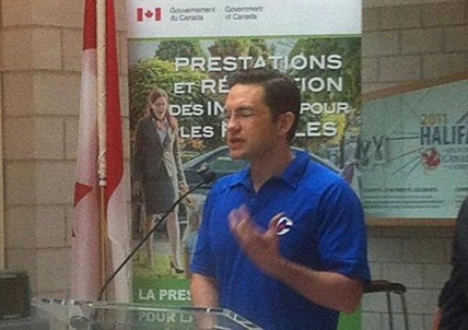 Elections watchdog says Tory golf shirt at child benefit event broke rules | iNFOnews.ca