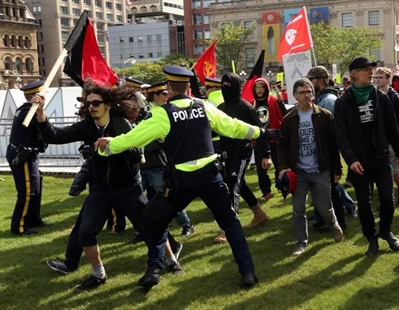Pro- and anti- immigration protesters face off in duelling rallies | iNFOnews.ca