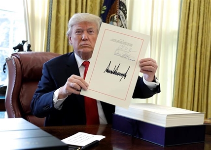 With stroke of pen signing major bill, Trump caps a consequential first year | iNFOnews.ca With stroke of pen signing major bill, Trump caps a consequential first year | iNFOnews.ca
