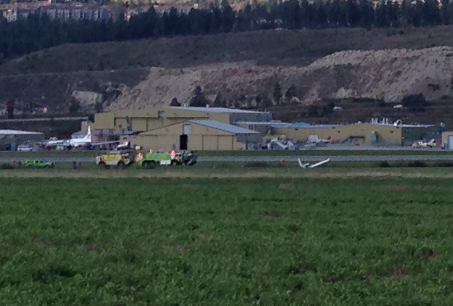 Crash at Kelowna airport, small plane slides off runway into Mill Creek | iNFOnews.ca