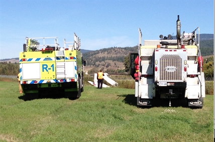 Crash at Kelowna airport, small plane slides off runway into Mill Creek | iNFOnews.ca