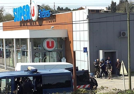 French police storm supermarket, kill hostage-taker; 3 dead | iNFOnews.ca